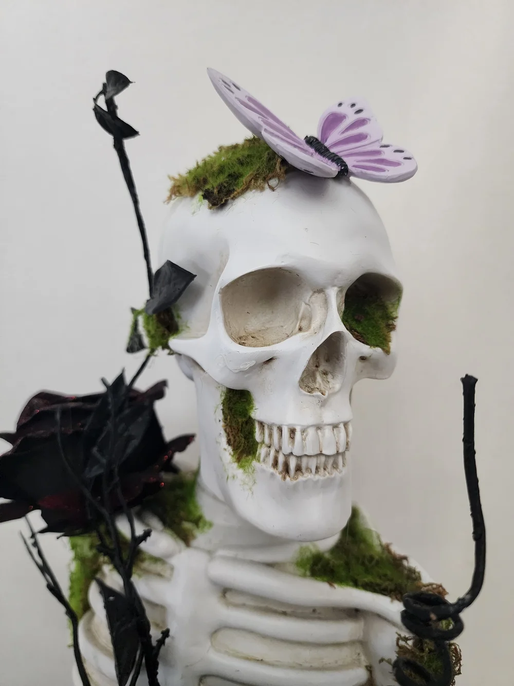 Skeleton Bust Floral Accent with Purple Roses by